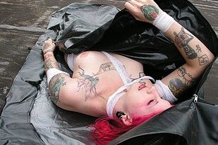 Topless goth girl emerges from a body bag in these shots - Punk Rock Girlfriend