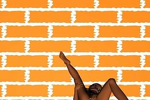CGI slut naked and up against a yellow brick wall