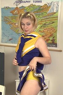 A cheerleading nympho fingering her pussy in class