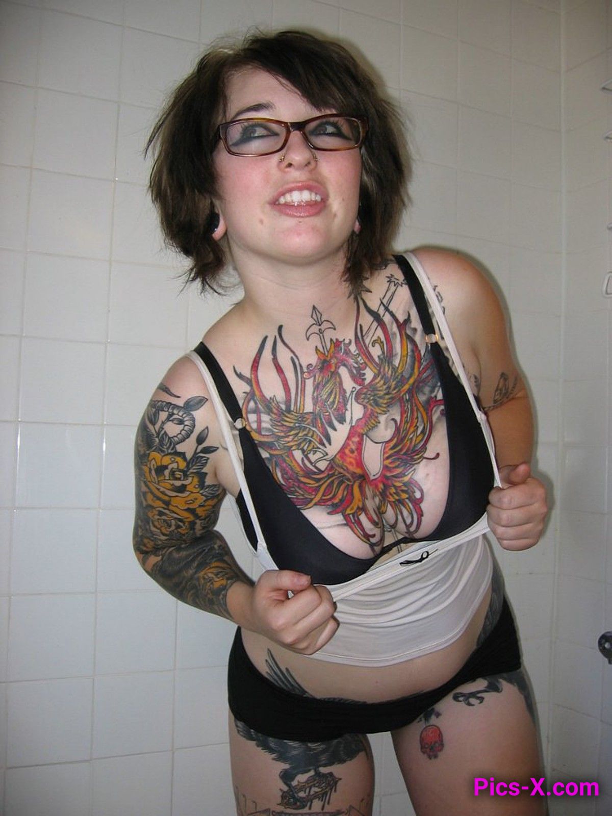 Tattooed girl with running makeup posing naked at home - Punk Rock Girlfriend - Image 1
