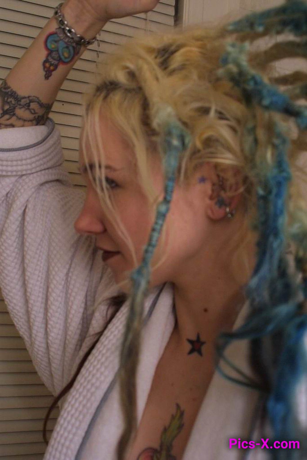 Tattooed blonde hottie enjoying a slow shower - Punk Rock Girlfriend - Image 1