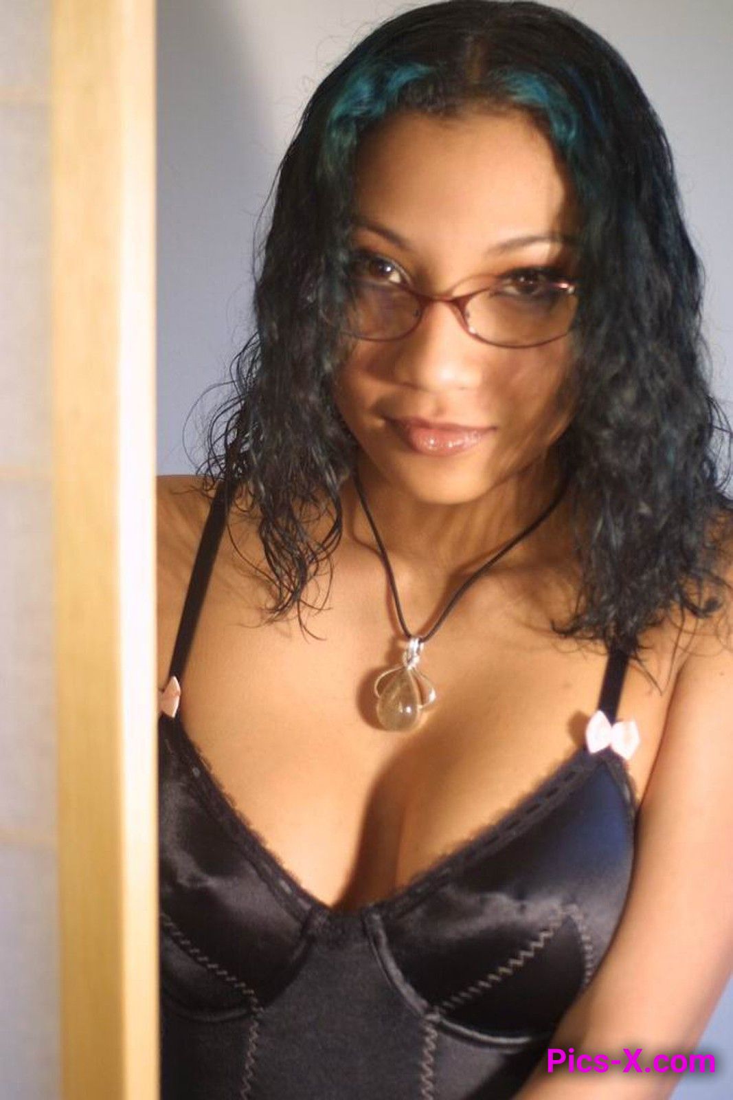 Exotic looking babe posing naked except for her glasses - Punk Rock Girlfriend - Image 1