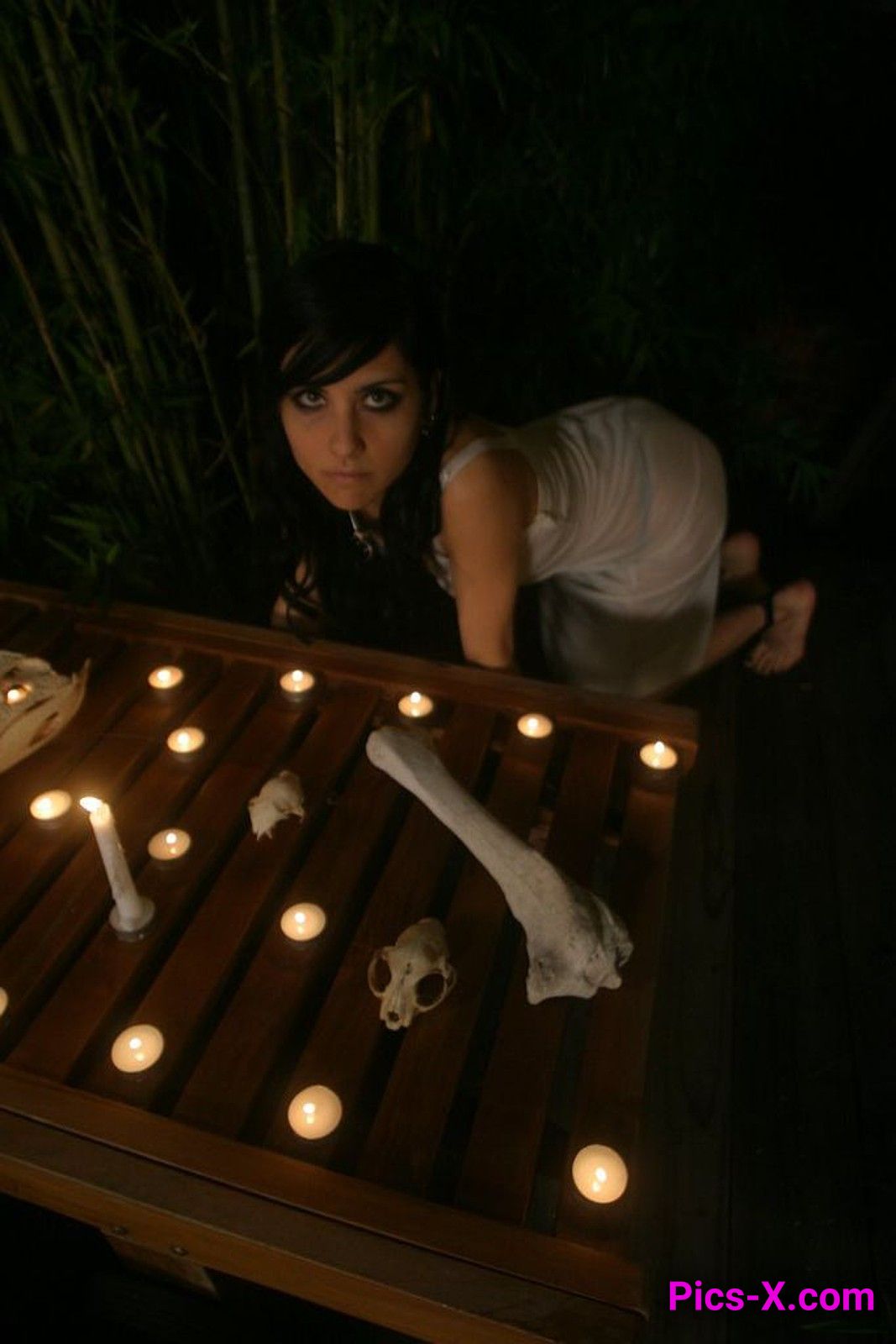 Dark haired gothic babe in a steamy candle lit hot tub - Punk Rock Girlfriend - Image 1